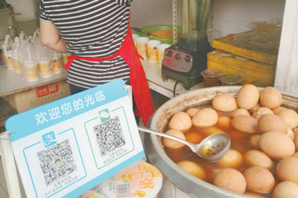 缩略图 | 中国卖鸡蛋都扫码了，移动支付为何在美国如此难行？